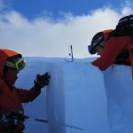 Digging a snow pit for avalanche research.