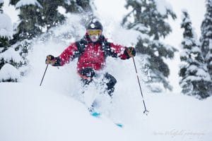 Deep Powder Skiing Through Snow Covered Trees in BC Canada